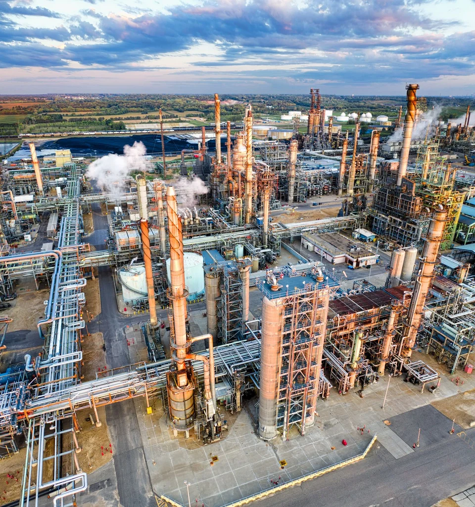 Aerial view of distillation columns and process units at a refinery